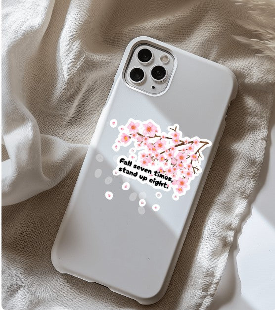 "Fall Seven Times Stand Up Eight" Sticker – Japanese Resilience Quote with Cherry Blossom Art