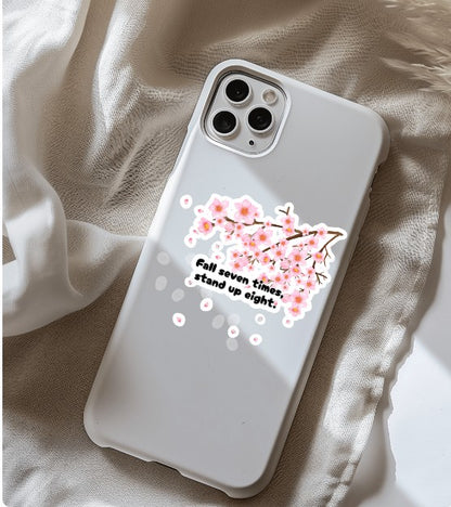 "Fall Seven Times Stand Up Eight" Sticker – Japanese Resilience Quote with Cherry Blossom Art